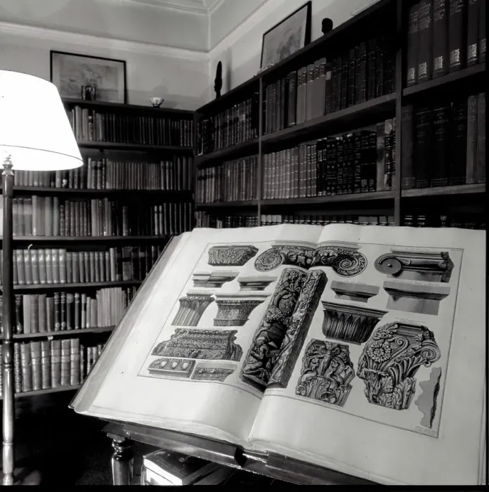 Framed Print : Bertrand Russell, 3rd Earl Russell (1872-1970), British philosopher and author -- a large book open at a page of architectural illustrations in the study of his home, Plas Penrhyn, Wales. Date: late 1960s Framed Print : Bertrand Russell, 3rd Earl Russell (1872-1970), British philosopher and author -- a large book open at a page of architectural illustrations in the study of his home, Plas Penrhyn, Wales. Date: late 1960s