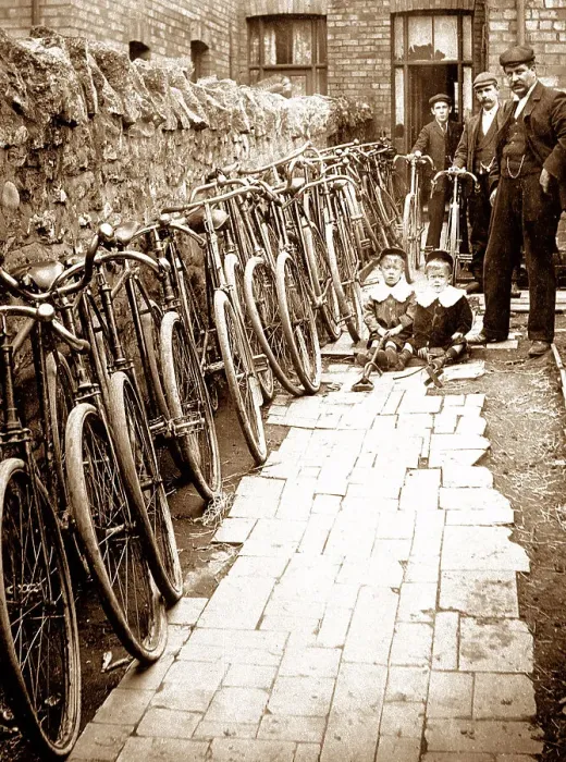Framed Print : Bicycle dealer or repairer early 1900s Framed Print : Bicycle dealer or repairer early 1900s