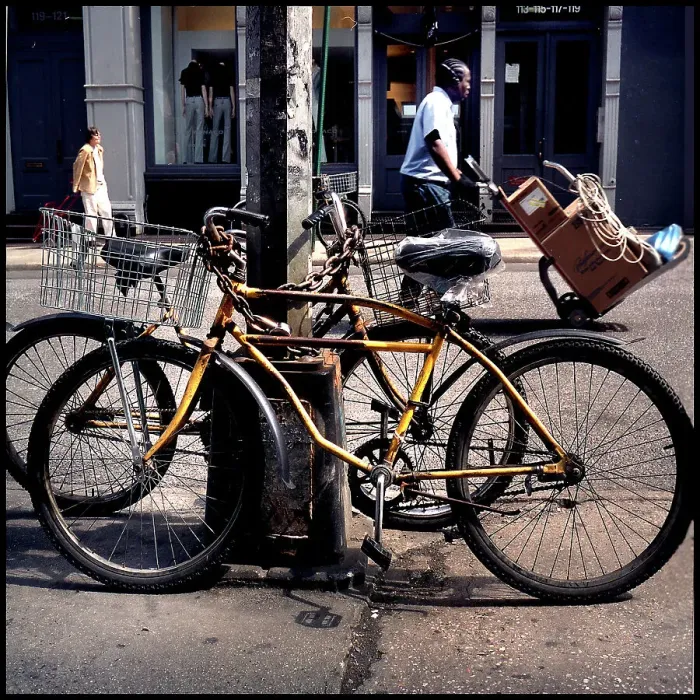 Framed Print : Bicycles and figures in New York Street Framed Print : Bicycles and figures in New York Street