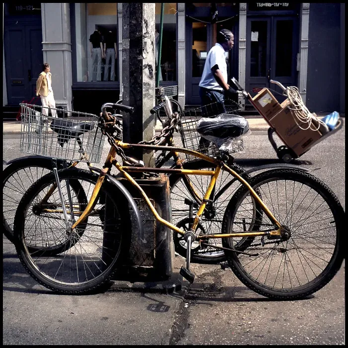 Framed Print : Bicycles and figures in New York Street, USA Framed Print : Bicycles and figures in New York Street, USA