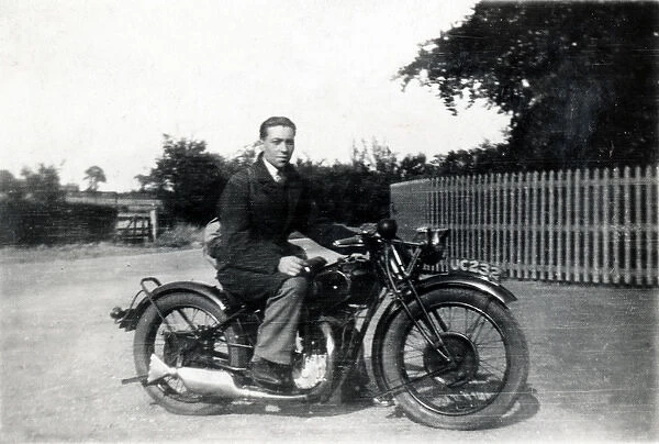 Biker on his 1929  /  30 Rudge motorcycle
