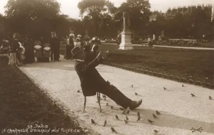 Framed Print : Bird charmer of the Tuileries Gardens Framed Print : Bird charmer of the Tuileries Gardens