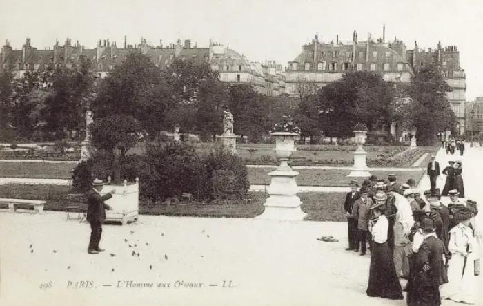 Framed Print : Bird charmer of the Tuileries Gardens Framed Print : Bird charmer of the Tuileries Gardens