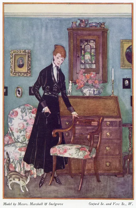 Framed Print : Black gown by Marshall & Snelgrove: raglan sleeves, turn back cuffs, long gored skirt with tiny patch pockets ornamented with tassels, white blouse & Louis heel shoes. Date: 1915