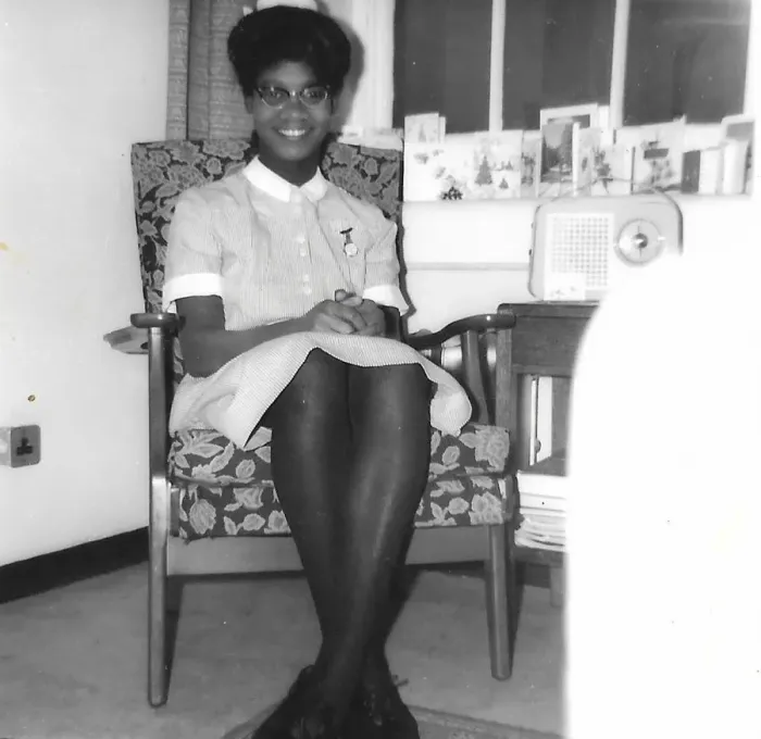 Framed Print : Black student nurse sitting in her room in Nottingham Framed Print : Black student nurse sitting in her room in Nottingham