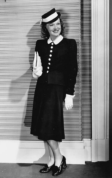 A black wool suit designed by Dolly Tree