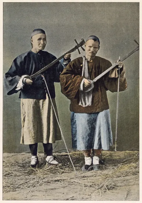 Framed Print : Two blind beggars playing stringed instruments. Date: 1890s Framed Print : Two blind beggars playing stringed instruments. Date: 1890s