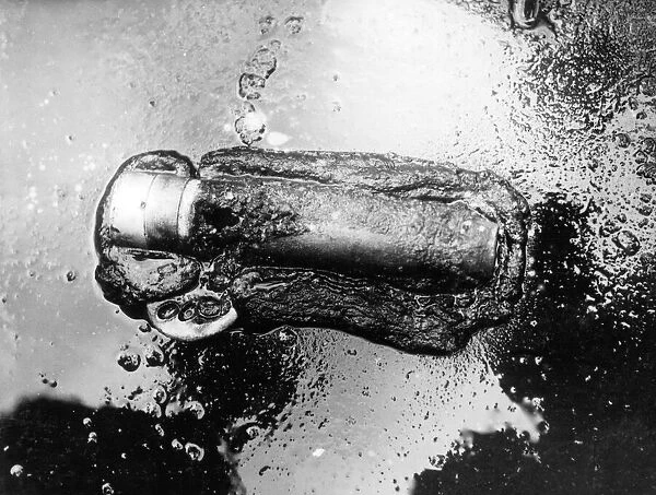 Blitz in London -- burnt-out incendiary device, WW2