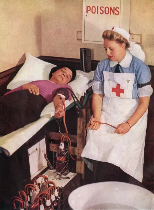 Framed Print : A blood donor at a Civil Defence First-Aid Station Framed Print : A blood donor at a Civil Defence First-Aid Station