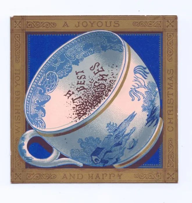 Framed Print : Blue and white china cup on a Christmas postcard Framed Print : Blue and white china cup on a Christmas postcard