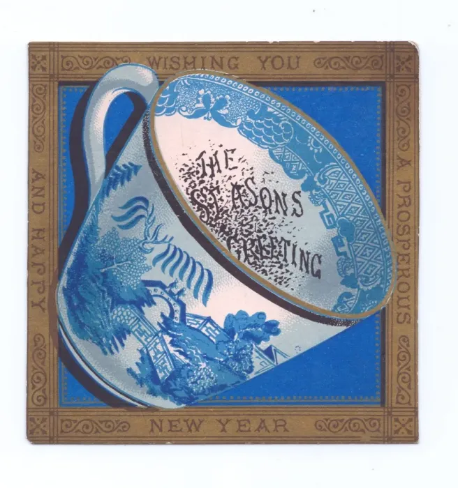 Framed Print : Blue and white china cup on a New Year postcard Framed Print : Blue and white china cup on a New Year postcard