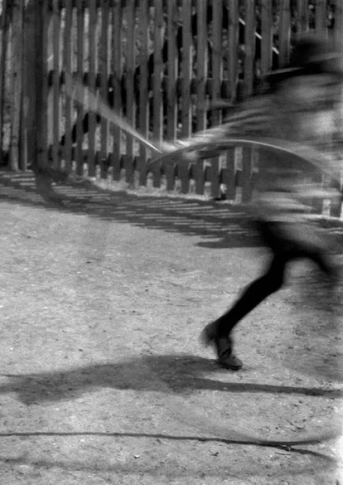 Framed Print : Blurred image of child with hoop and stick Framed Print : Blurred image of child with hoop and stick