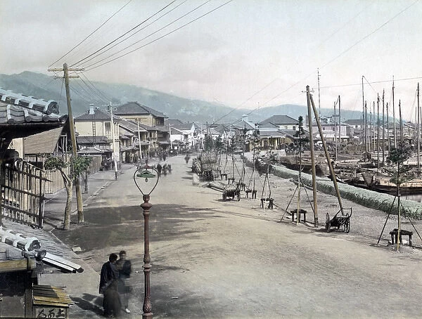 Boats tied up along the Bund, Kobe, Japan, circa 1880s