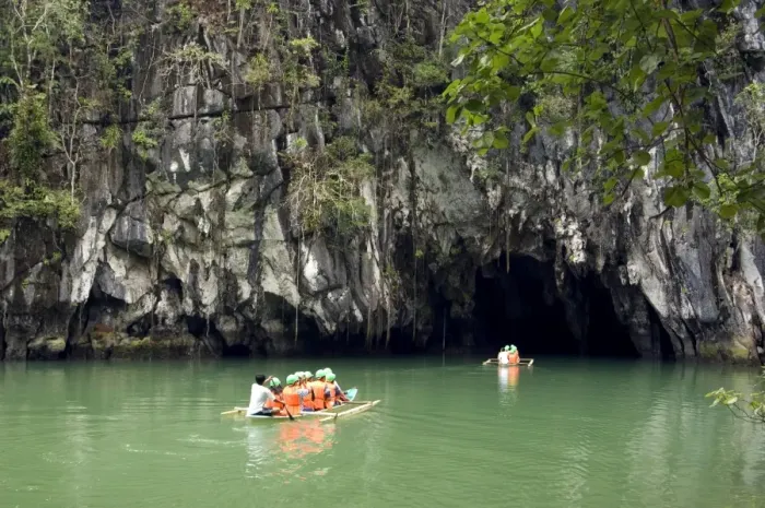 Framed Print : Boats with tourists enter the cave, that features Framed Print : Boats with tourists enter the cave, that features