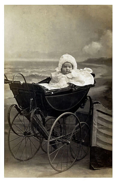 A Bonny Baby in an extremely fine Victorian perambulator