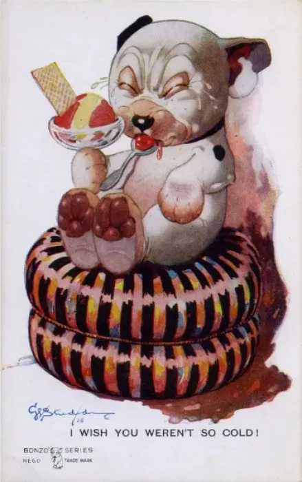 Framed Print : Bonzo on a cushion eating ice-cream Framed Print : Bonzo on a cushion eating ice-cream