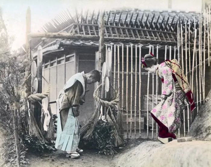 Framed Print : Bowing in greeting, Japan, circa 1890s. Date: circa 1890s
