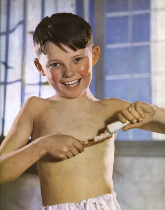 Framed Print : A boy cleaning his teeth Framed Print : A boy cleaning his teeth