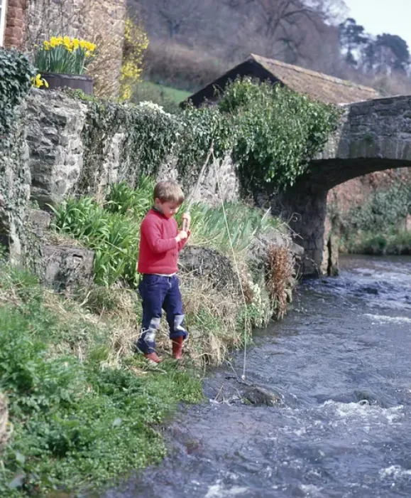 Framed Print : Boy fishing in a stream, Allerford, Somerset Framed Print : Boy fishing in a stream, Allerford, Somerset