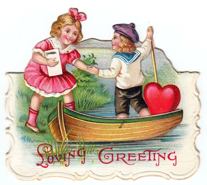 Framed Print : Boy and girl with a boat on a cutout Valentine card Framed Print : Boy and girl with a boat on a cutout Valentine card