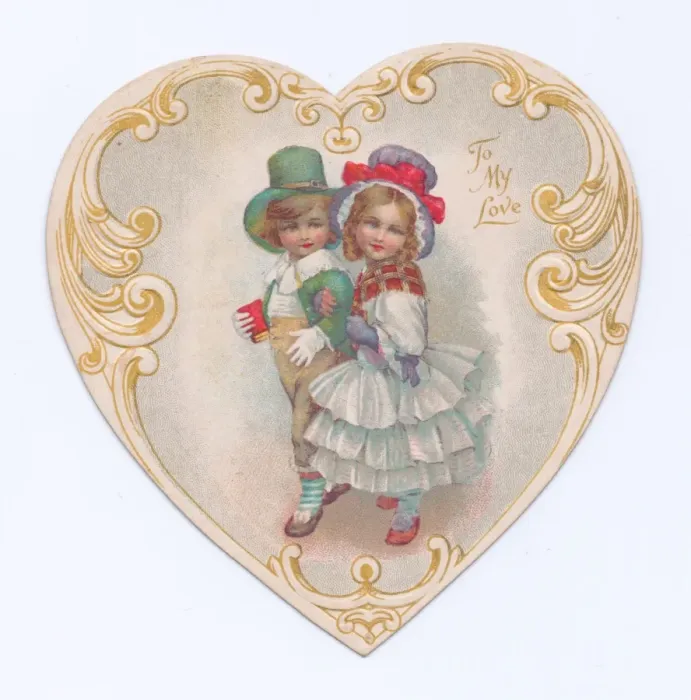 Framed Print : Boy and girl on a heart-shaped Valentines card Framed Print : Boy and girl on a heart-shaped Valentines card