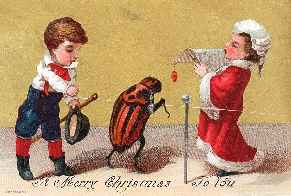 Boy and girl with large ladybird on a Christmas card
