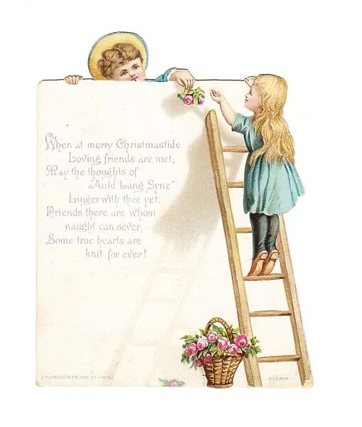 Boy and girl with pink roses on a cutout Christmas card