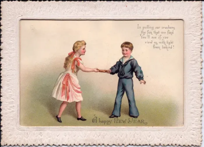 Framed Print : Boy and girl pulling cracker on a New Year card Framed Print : Boy and girl pulling cracker on a New Year card