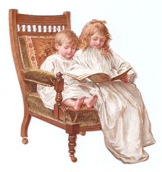 Boy and girl reading on a chair-shaped greetings card