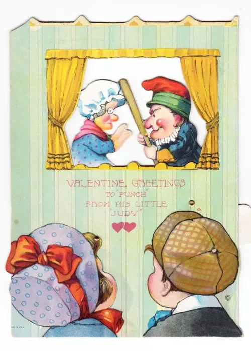 Framed Print : Boy and girl watching Punch and Judy on a Valentines card Framed Print : Boy and girl watching Punch and Judy on a Valentines card