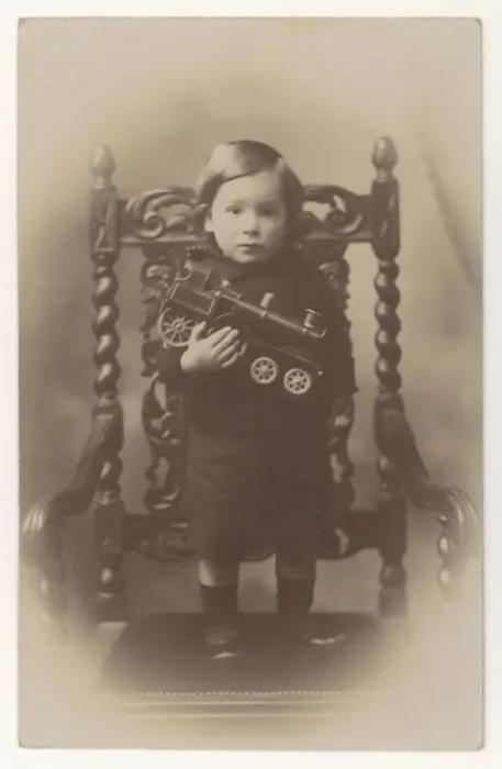 Framed Print : Boy Holding Toy Engine Framed Print : Boy Holding Toy Engine