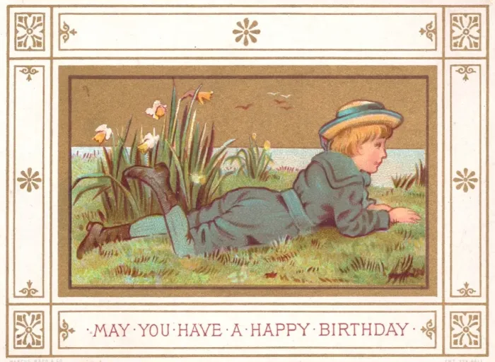 Framed Print : Boy lying on grass on a birthday card Framed Print : Boy lying on grass on a birthday card
