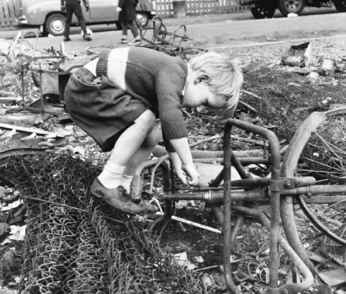 Framed Print : Boy playing with junk, Balham, SW London Framed Print : Boy playing with junk, Balham, SW London