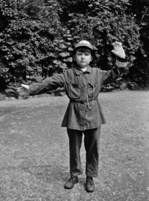 Framed Print : Boy in policemans uniform in a garden Framed Print : Boy in policemans uniform in a garden