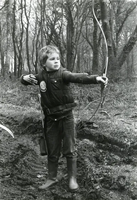 Framed Print : Boy practising archery in a wood Framed Print : Boy practising archery in a wood
