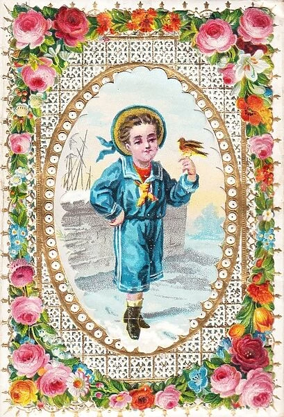 Boy with robin on a Christmas card