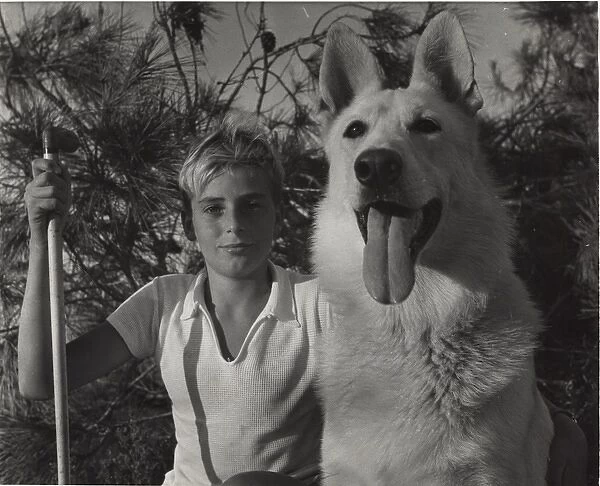 Boy scout with a large dog, Cyprus