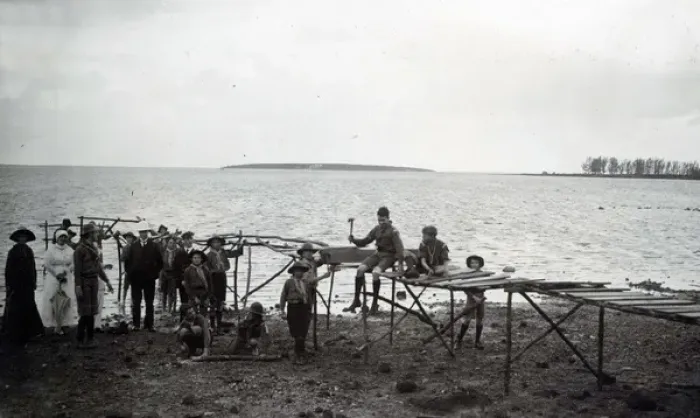 Framed Print : Boy scouts building a wooden jetty, Mauritius Framed Print : Boy scouts building a wooden jetty, Mauritius