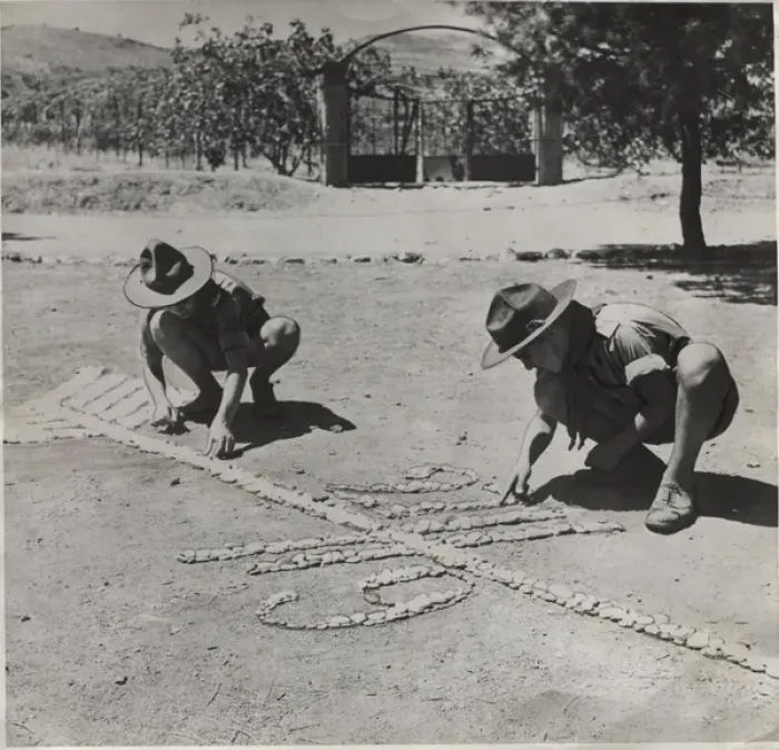 Framed Print : Boy scouts creating a design on the ground, Greece Framed Print : Boy scouts creating a design on the ground, Greece