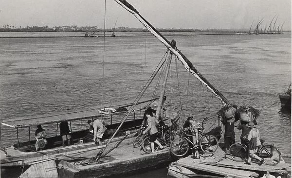 Boy scouts crossing the River Nile, Egypt