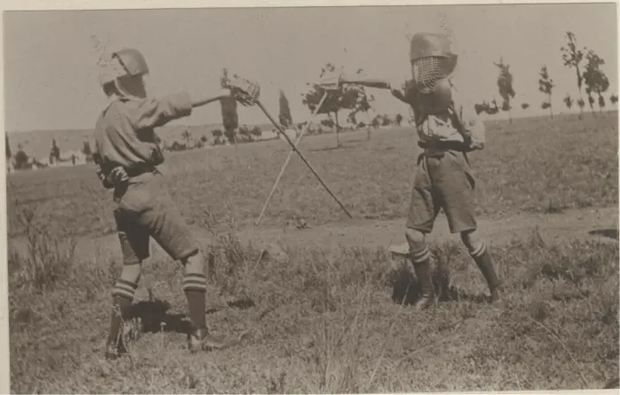 Framed Print : Two boy scouts fencing at camp Framed Print : Two boy scouts fencing at camp