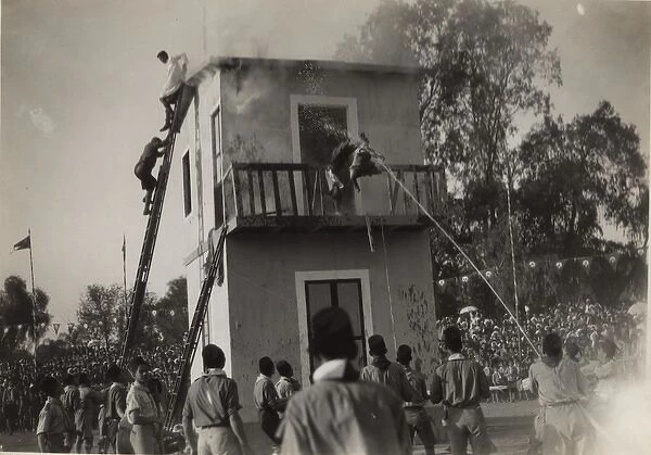 Boy scouts practising firefighting, Egypt