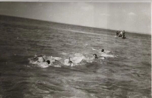 Boy scouts swimming in the sea, British Honduras