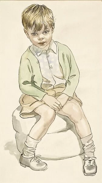 A Boy sitting on a pouffe
