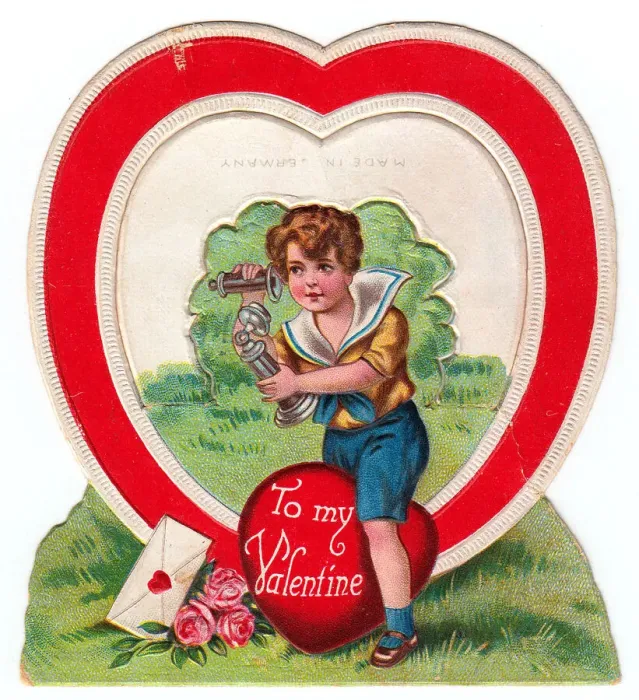 Framed Print : Boy with telephone on a heart-shaped Valentine card Framed Print : Boy with telephone on a heart-shaped Valentine card