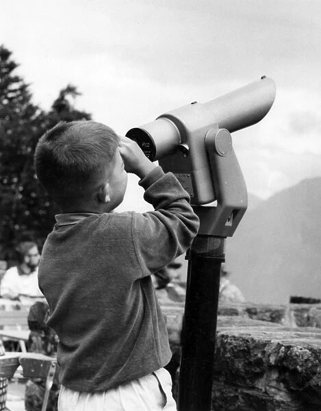 Boy Using a Telescope