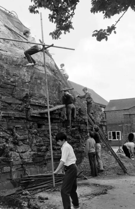 Framed Print : Boys build mountain at school, Seaford, East Sussex Framed Print : Boys build mountain at school, Seaford, East Sussex