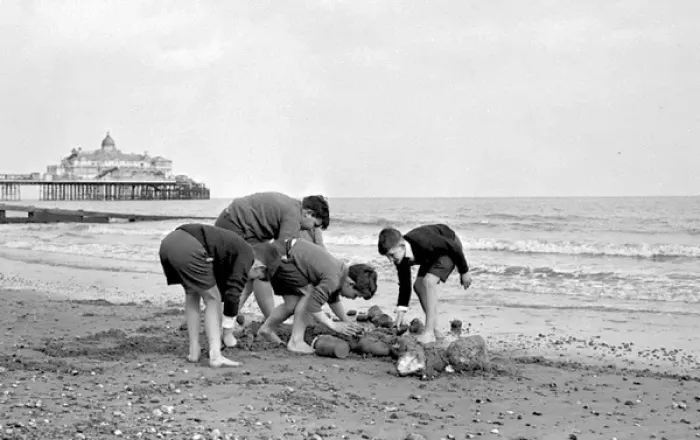 Framed Print : Boys building a sandcastle, Eastbourne, Sussex Framed Print : Boys building a sandcastle, Eastbourne, Sussex
