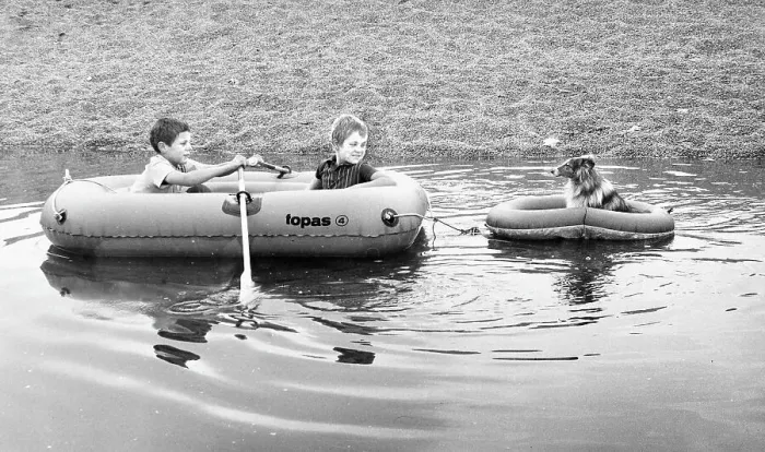 Framed Print : Two boys and a dog in rubber dinghies Framed Print : Two boys and a dog in rubber dinghies