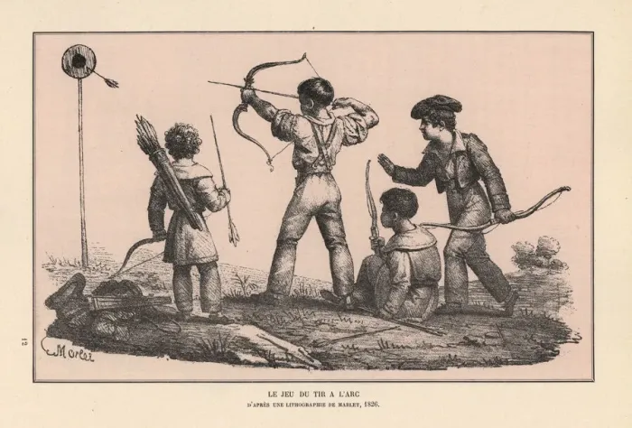 Framed Print : Boys firing arrows at a target in an archery Framed Print : Boys firing arrows at a target in an archery